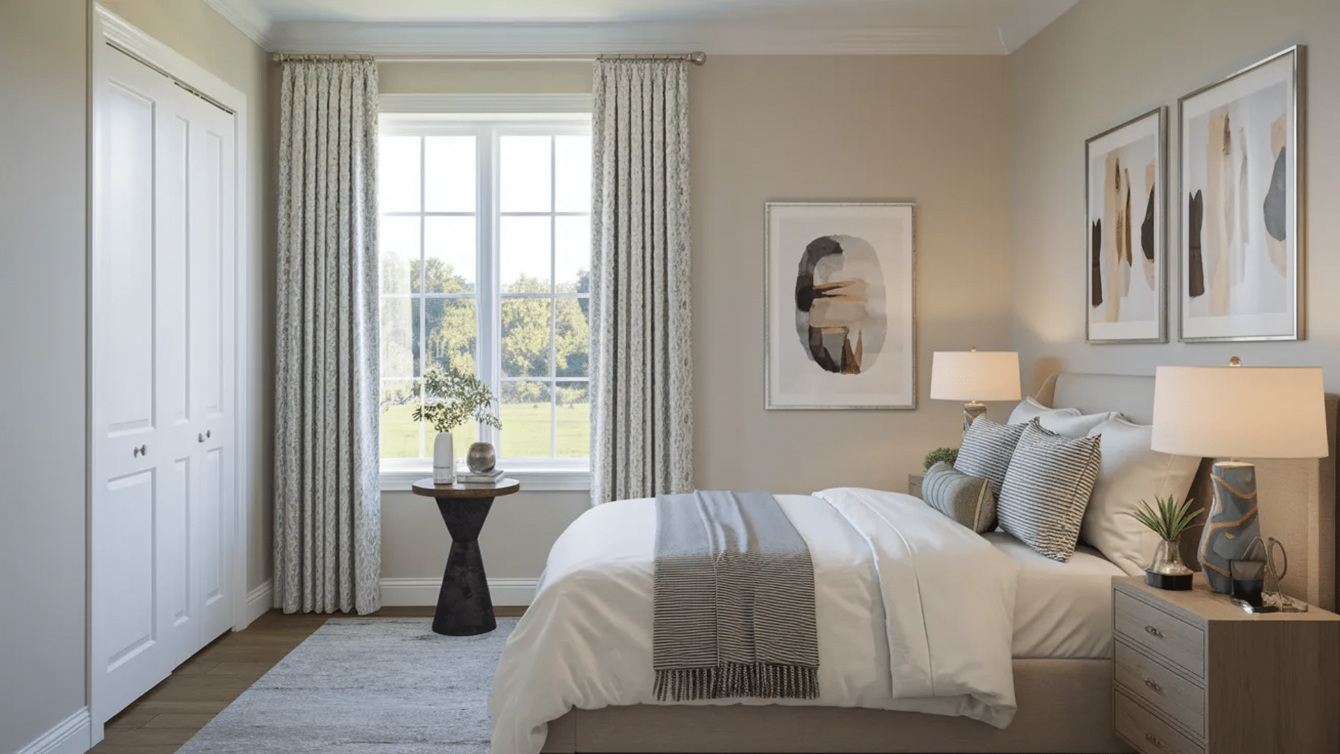 cozy bedroom with neutral bedding large window with curtains bedside lamps framed wall art small table and soft rug