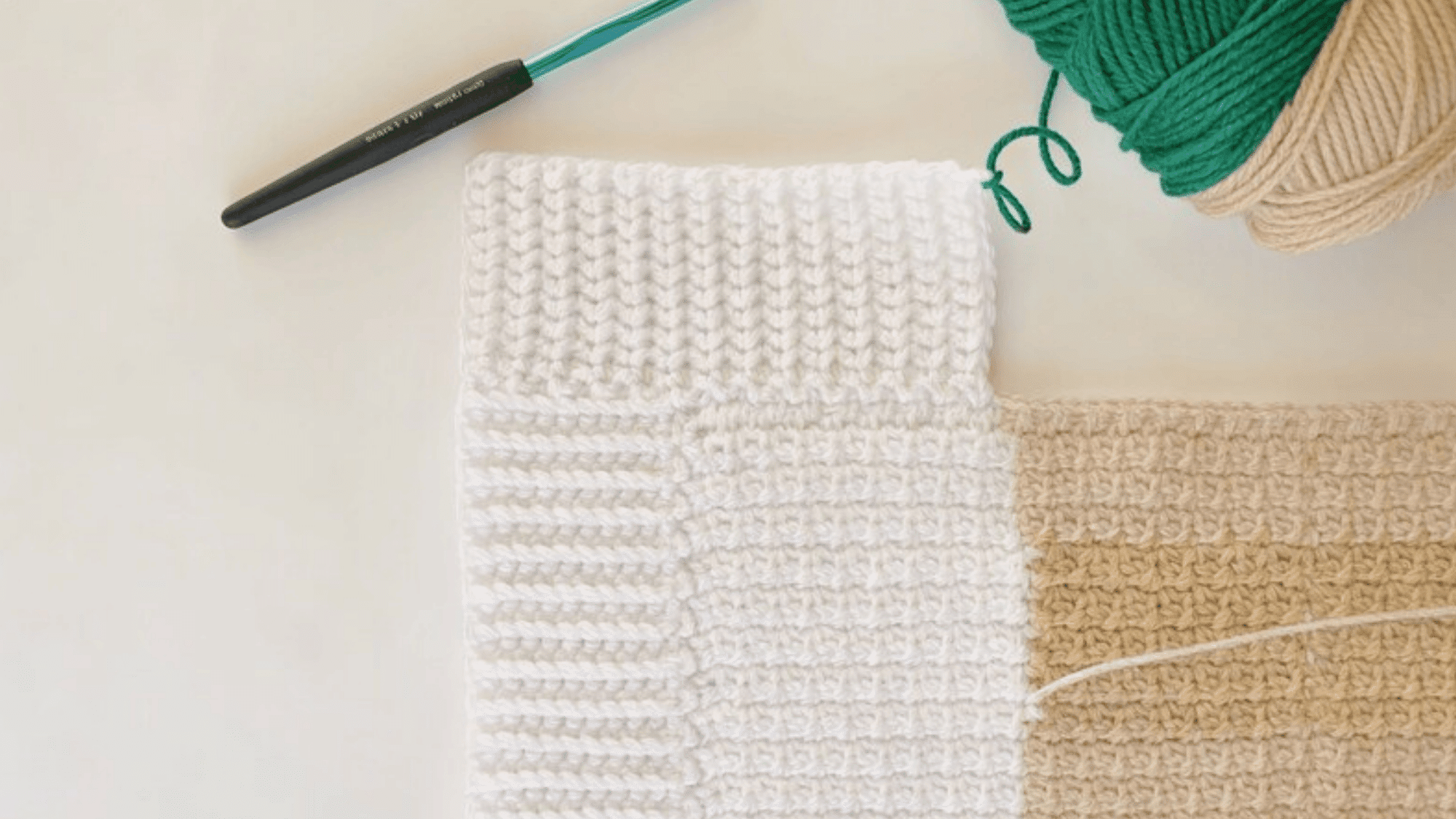 half-double stitch crochet border with even tight stitches, clean white yarn, visible ridge texture