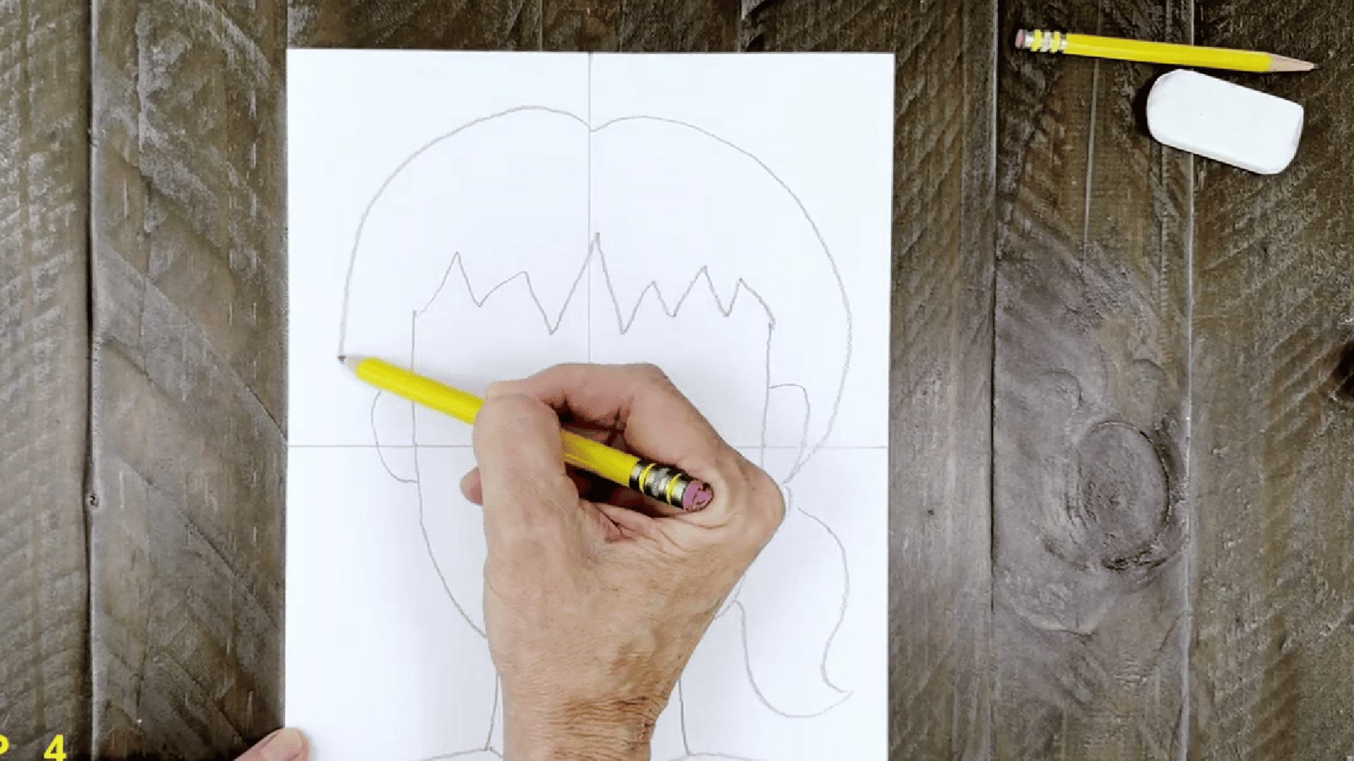 image shows the addition of a hairs with a jagged top and a ponytail.
