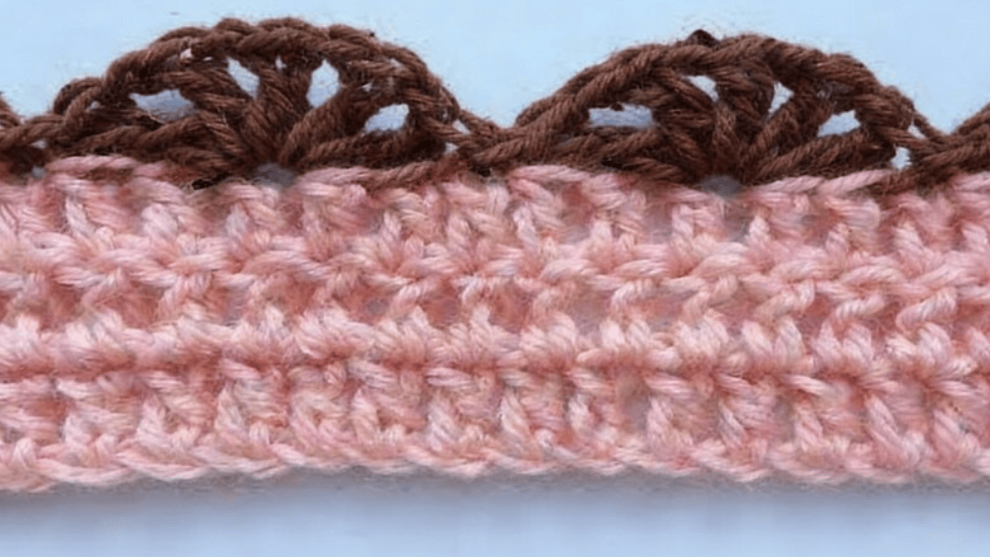 shell stitch crochet border, change yarn colors to soft sky blue shells and warm cream base
