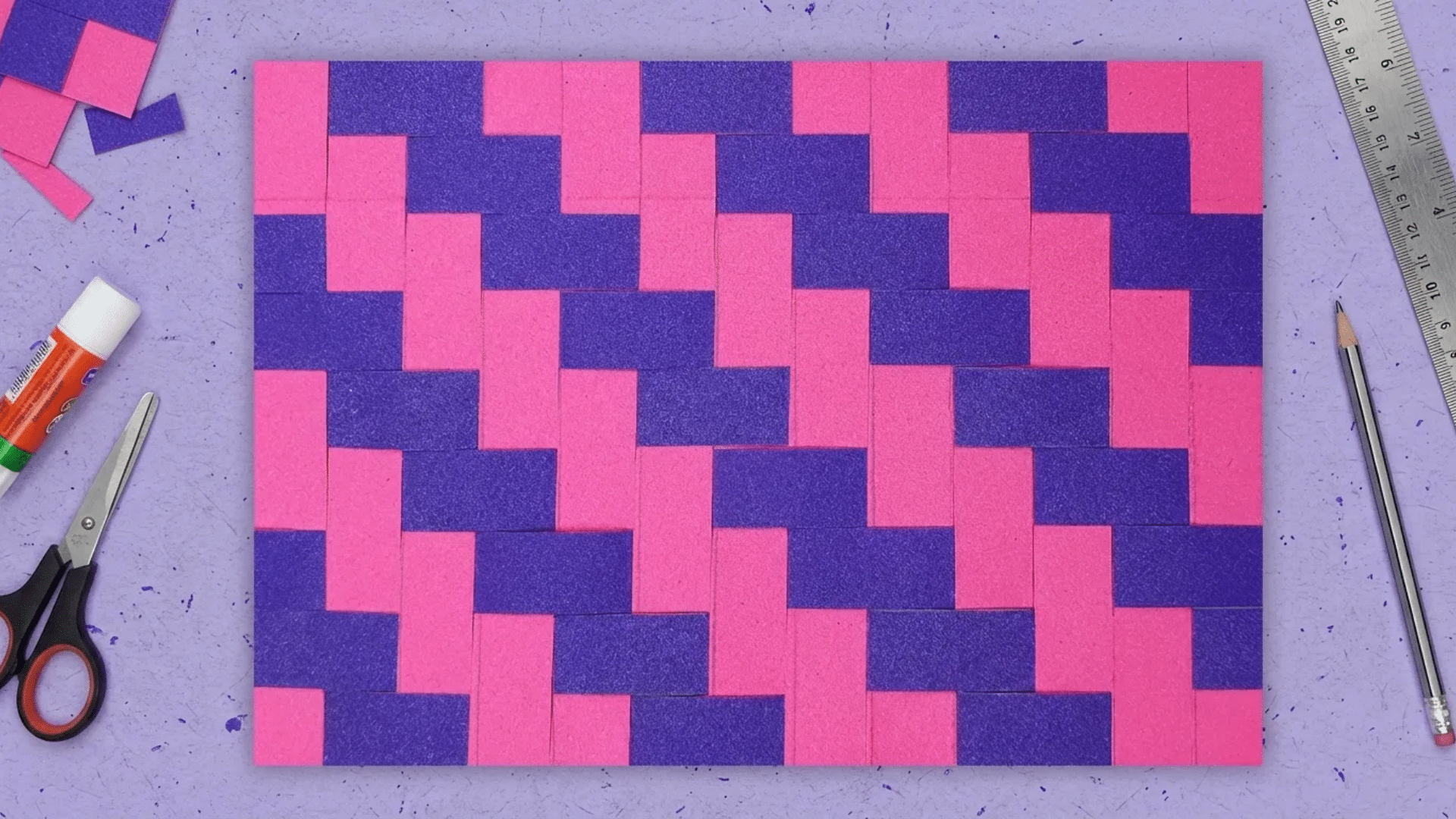 simple over-under woven mat made from pink and blue construction paper strips