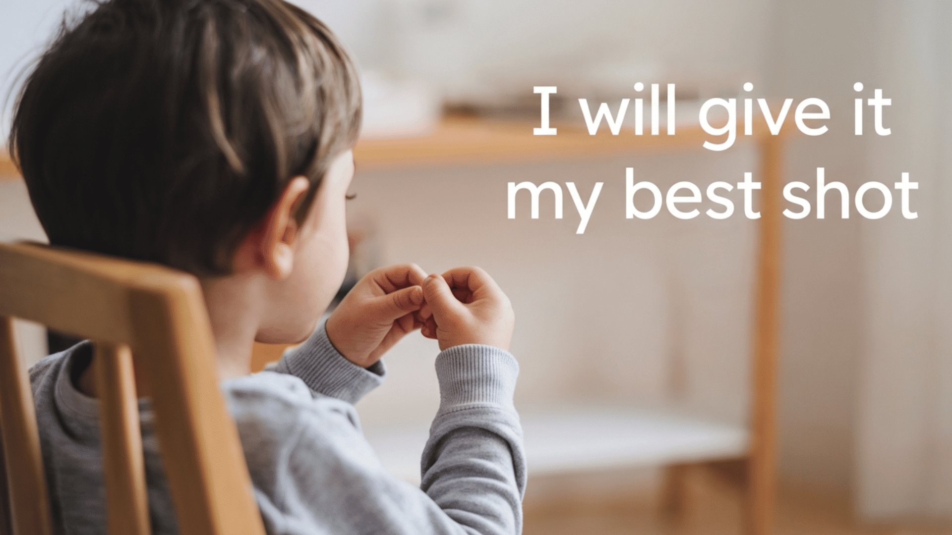 a child sitting at a table with hands clasped and the message I will give it my best shot.