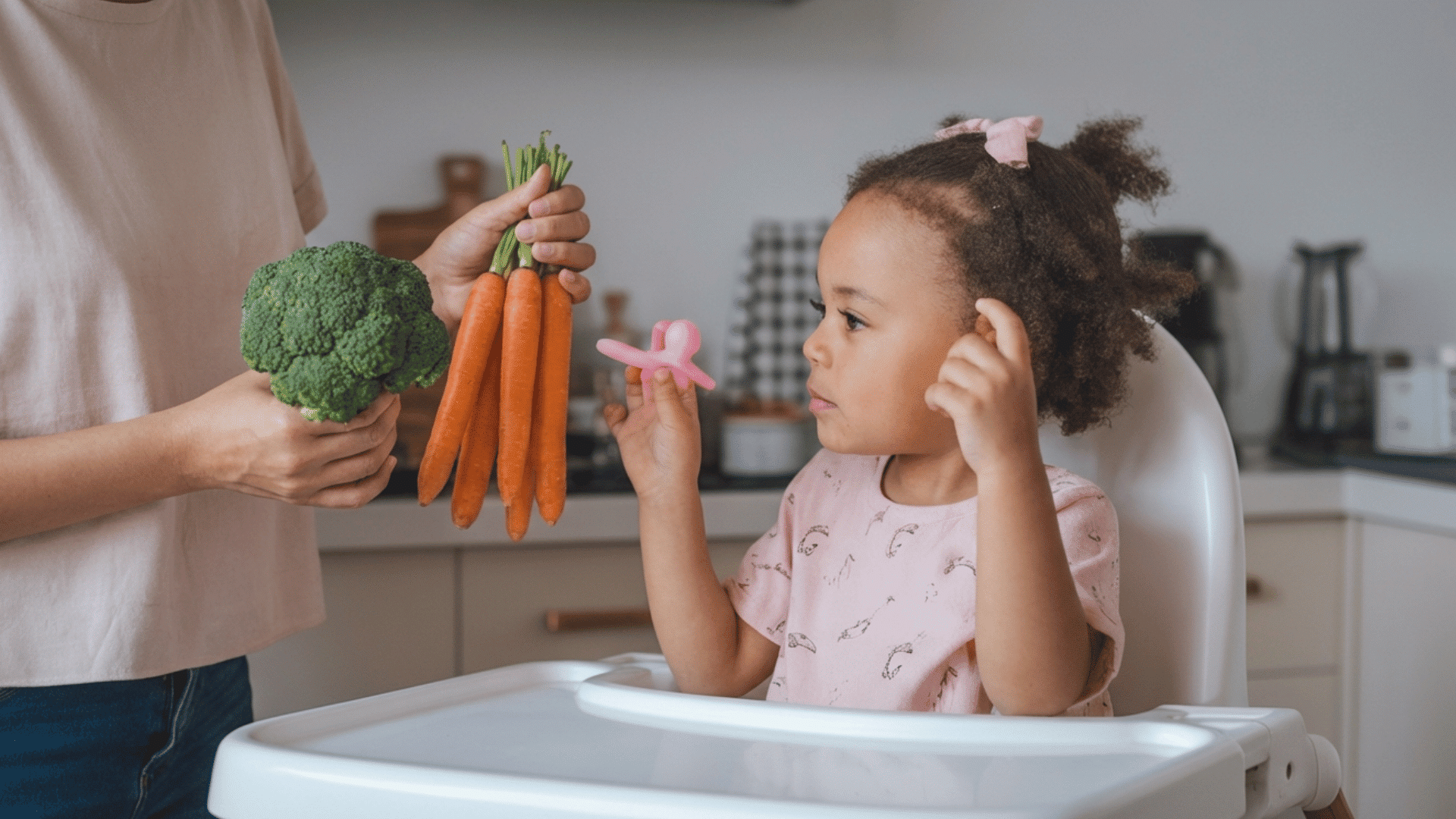 a mother asking her daughter what she wants to eat, carrots or broccoli tonight