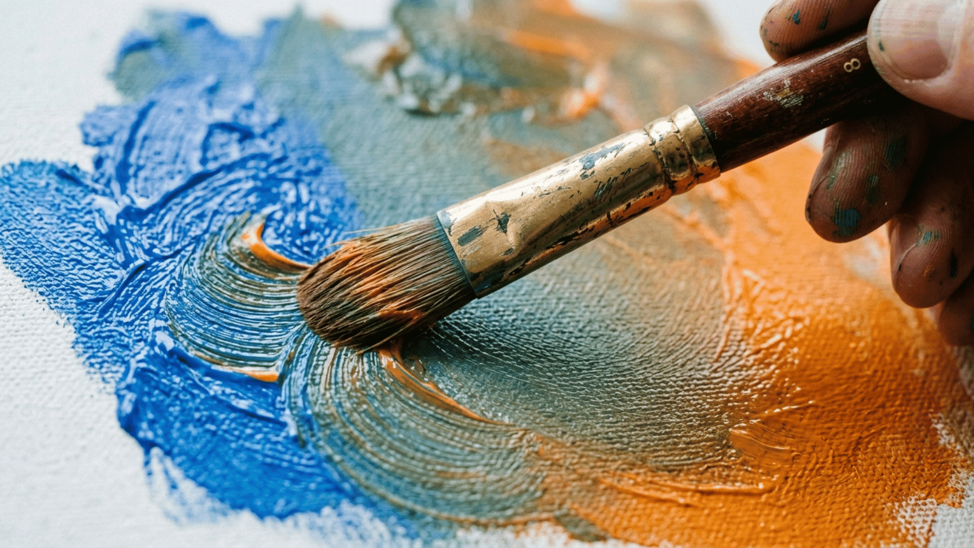 filbert acrylic paint brush blending blue and orange paint on canvas, showing smooth transitions with acrylic paint for canvas