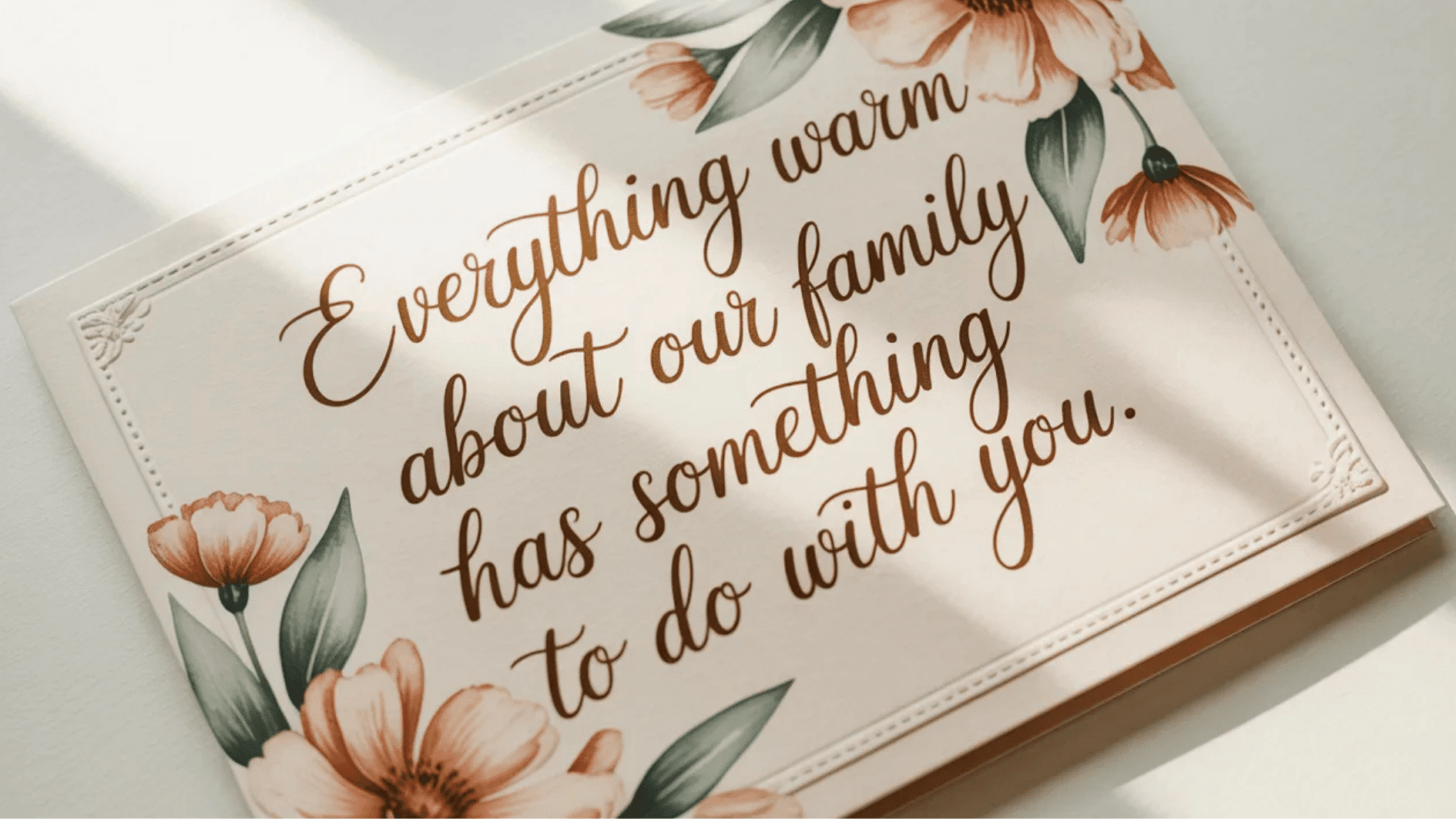 floral greeting card with warm message about family love, featuring soft botanical illustrations and elegant lettering