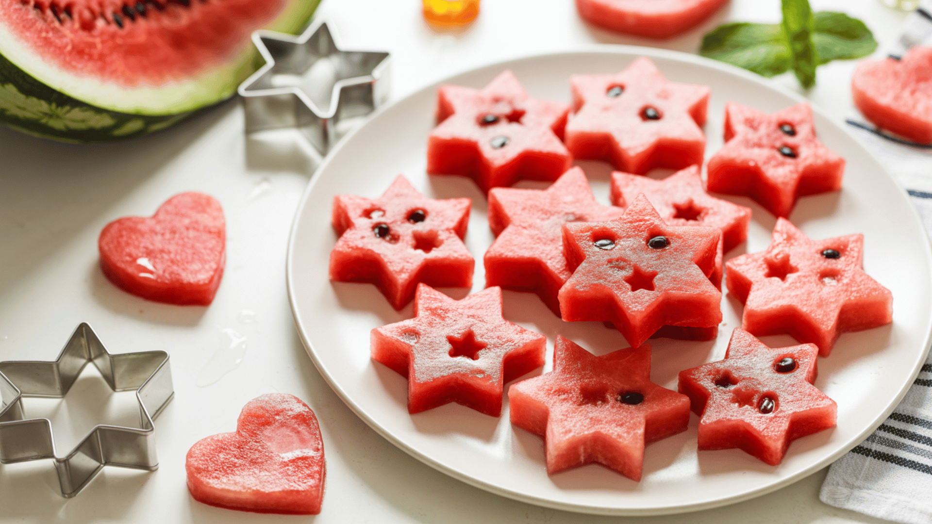 fun watermelon star shapes made using a cookie cutter for a playful snack