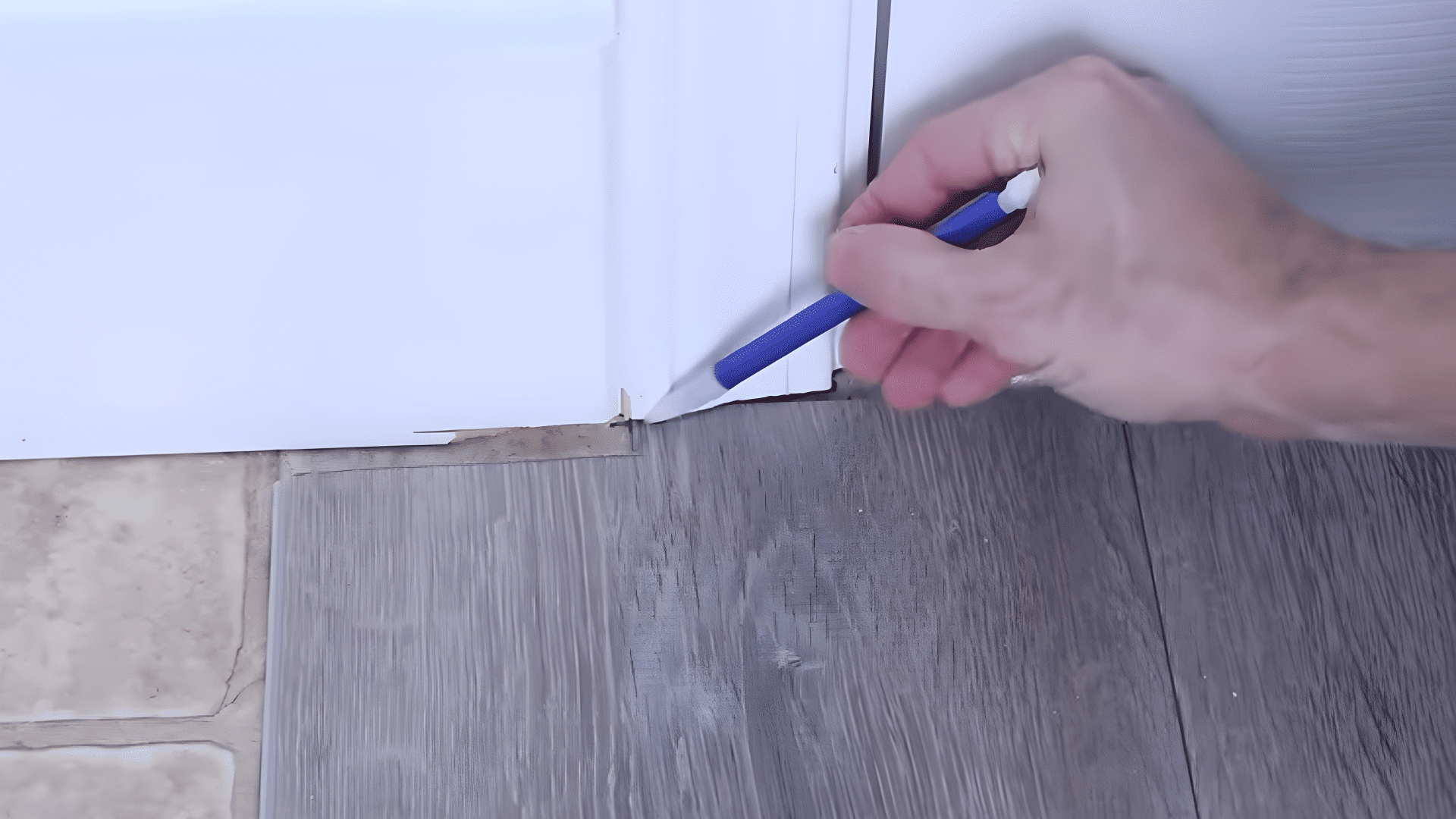 marking plank for precise cut near door frame for a tight fit