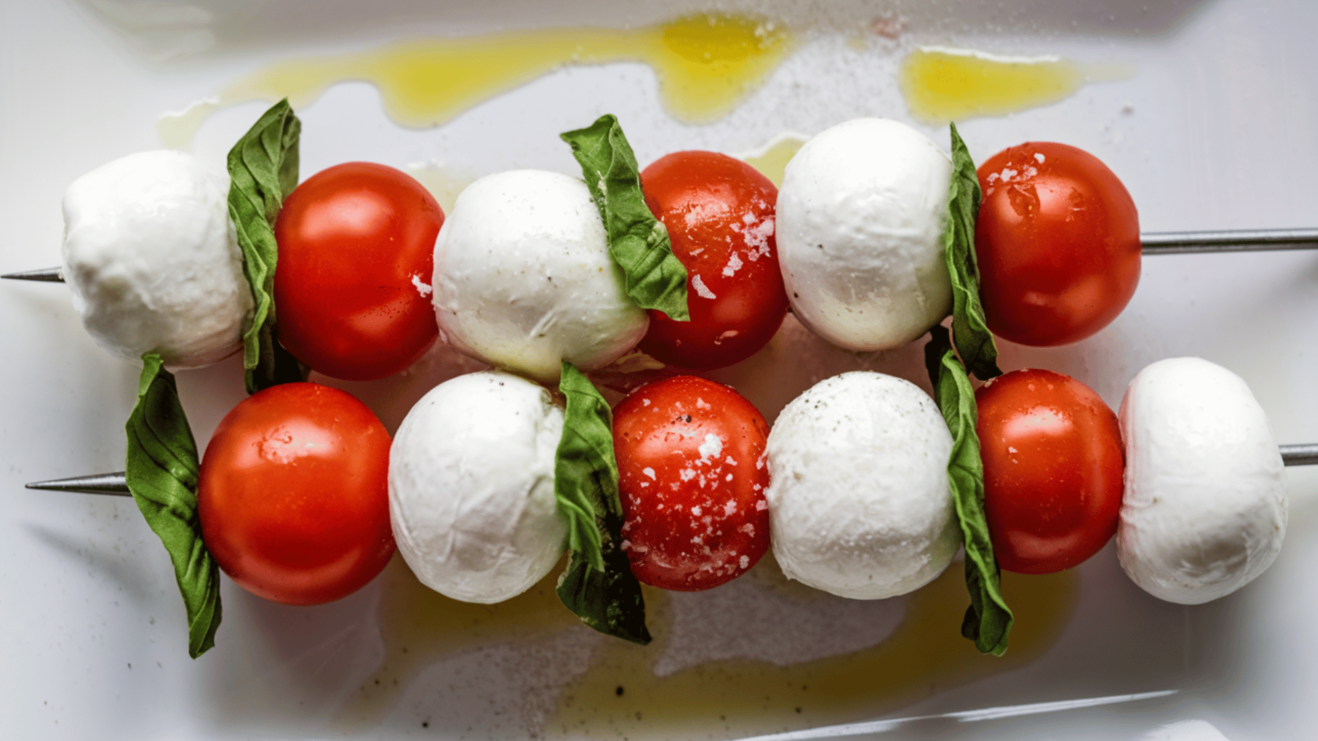 mini caprese skewers with cherry tomatoes and mozzarella balls for a healthy snack