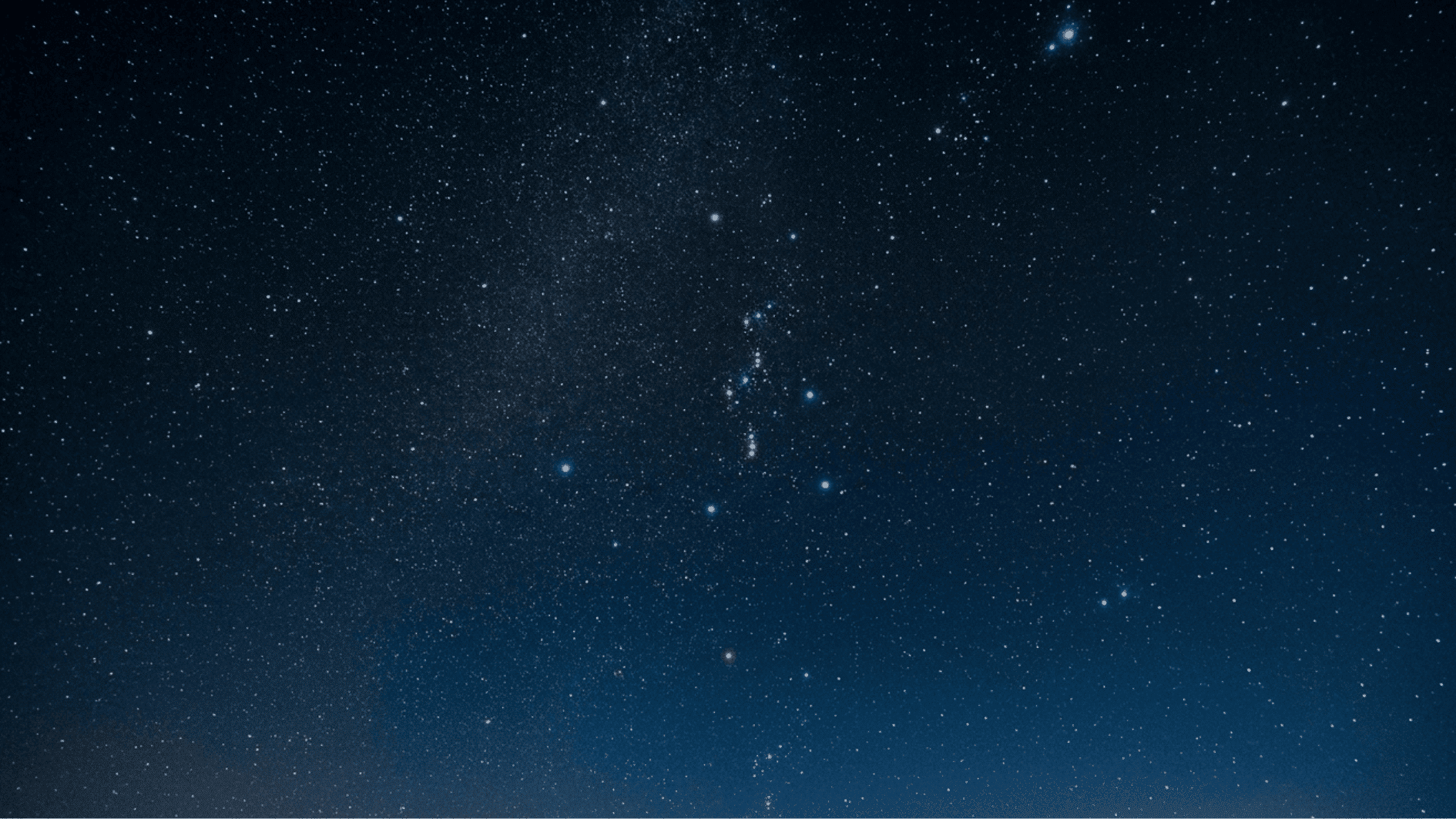 star-filled night sky with visible constellation patterns and deep space stars