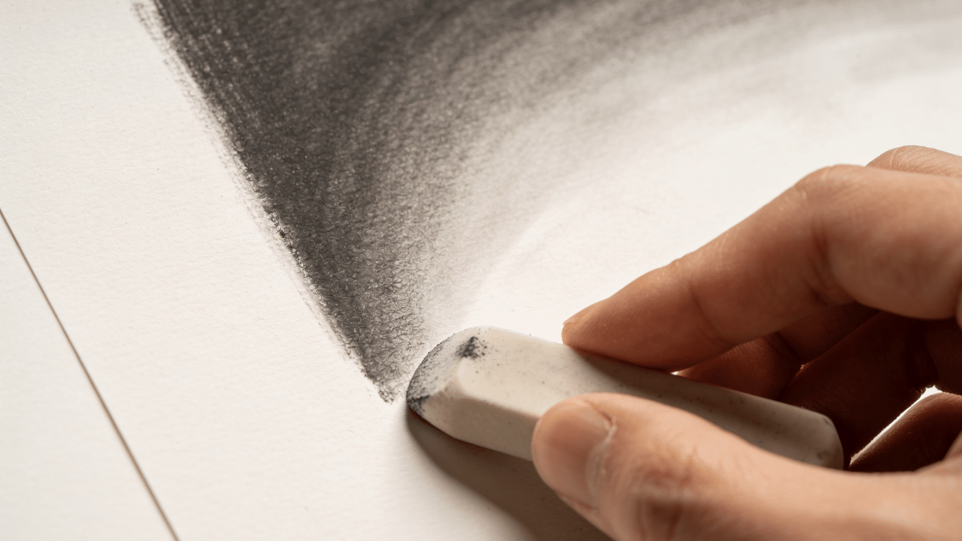 a person using blending and stumping method for their drawing anda close up of a full drawing made using this method of blending (1)