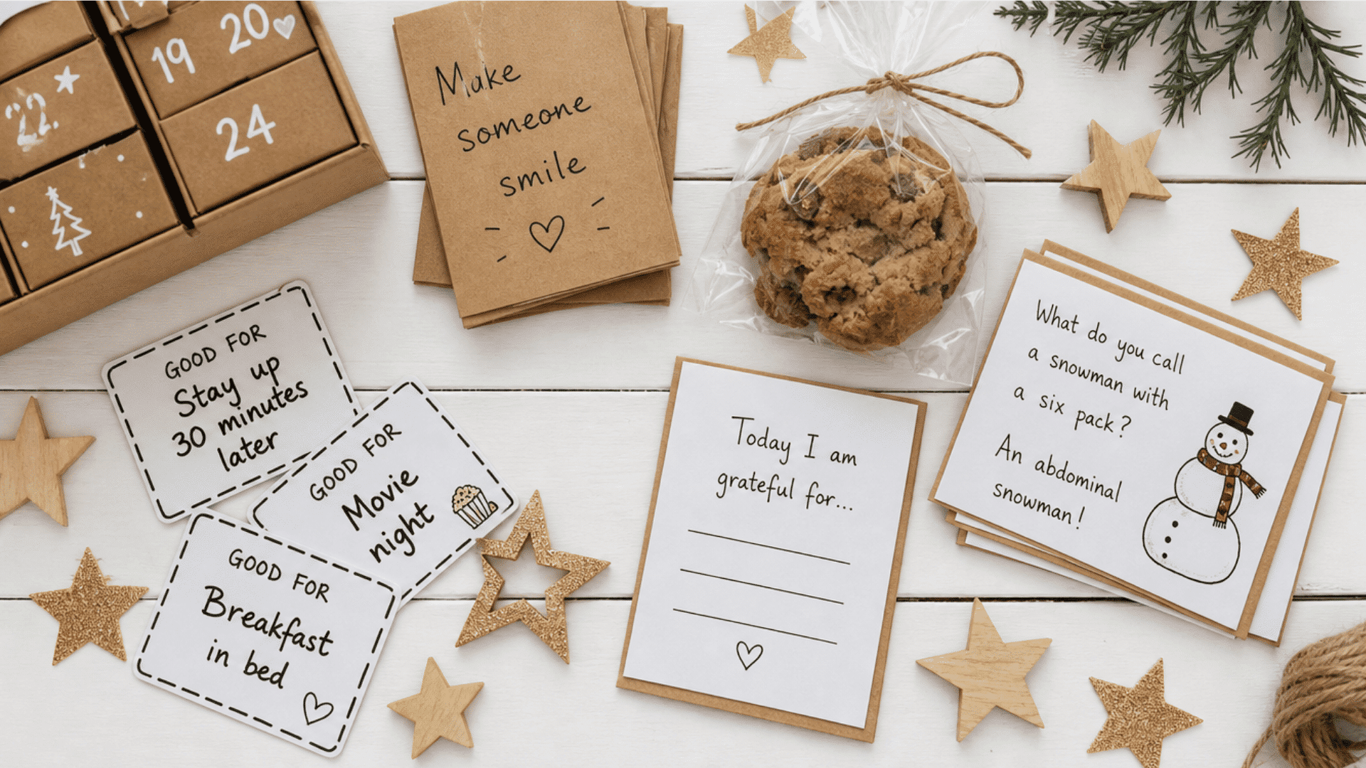 budget advent calendar with handwritten notes, joke cards, printable coupons, homemade cookie, and gratitude card