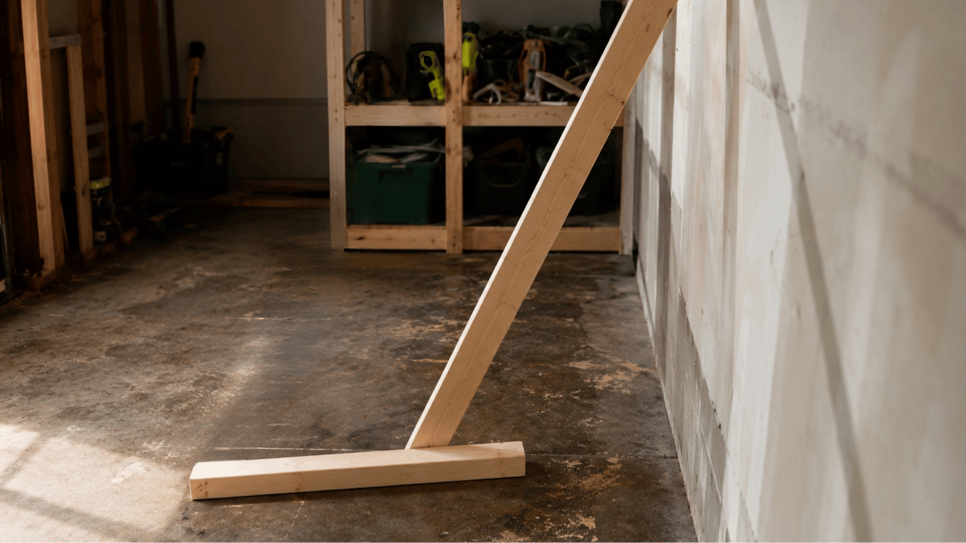 create the ladder angle by positioning a pine board against a wall in a realistic workshop scene