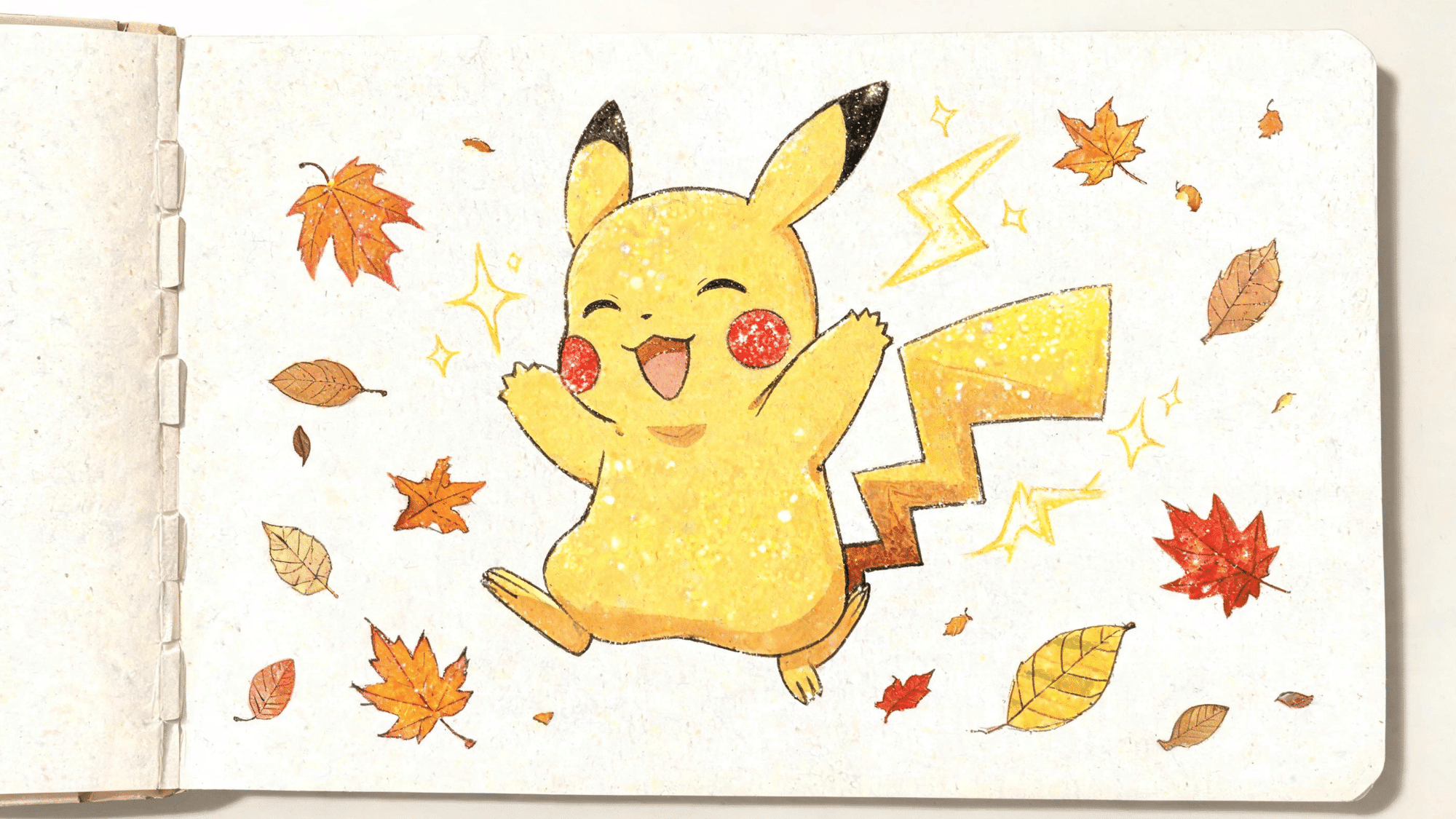sketchbook page showing a pikachu drawing made with glitter pens