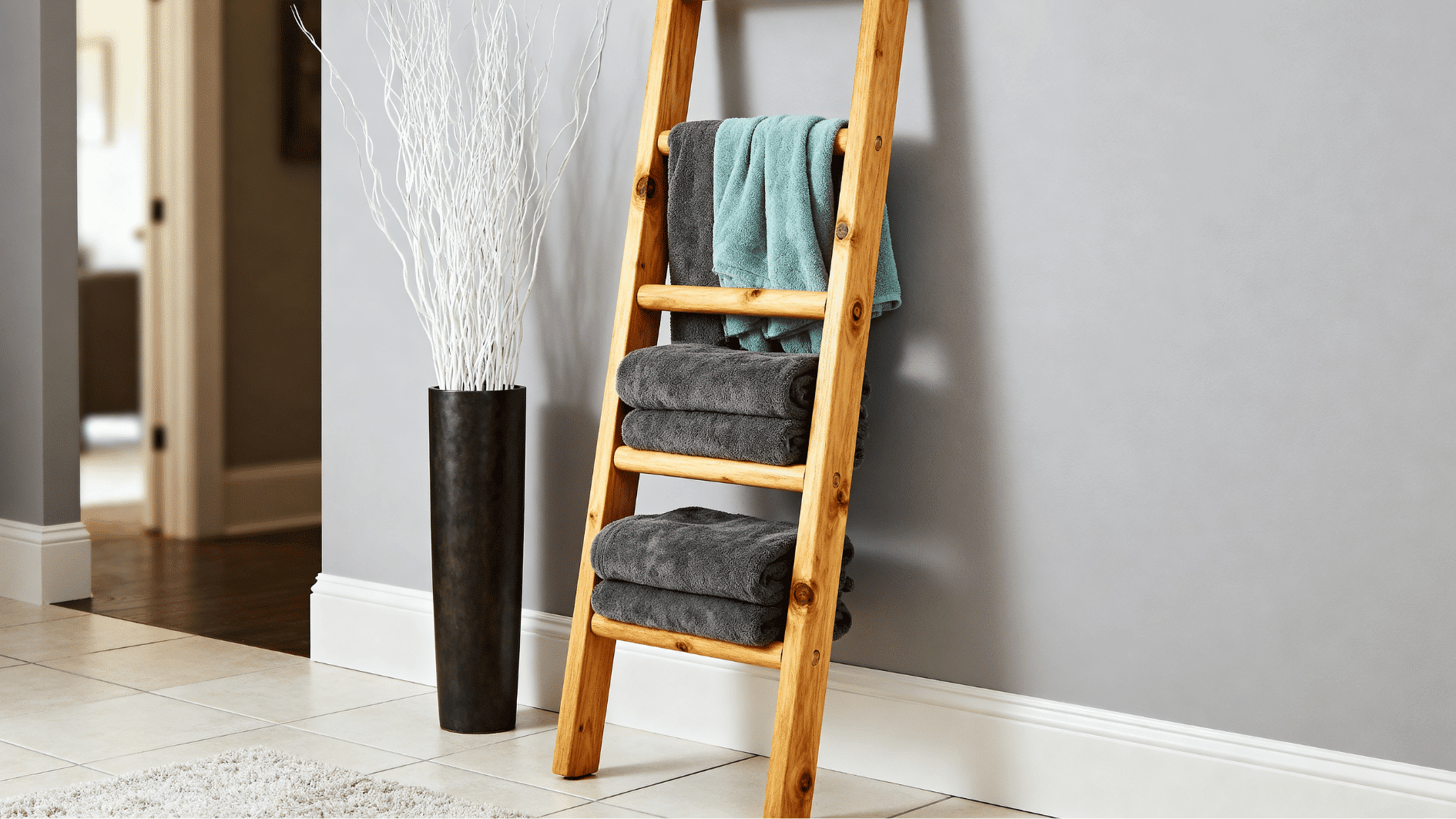 finished 6-foot wooden blanket ladder styled with folded throws in a modern farmhouse interior space