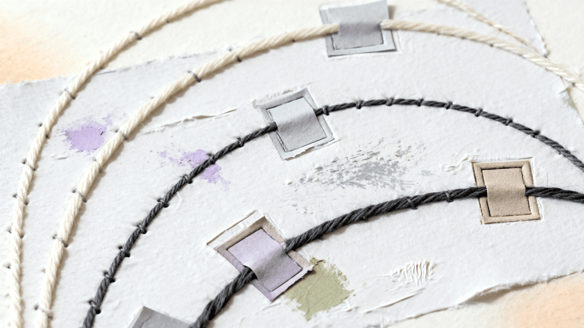 thread and paper line art with curved raised lines and painted background