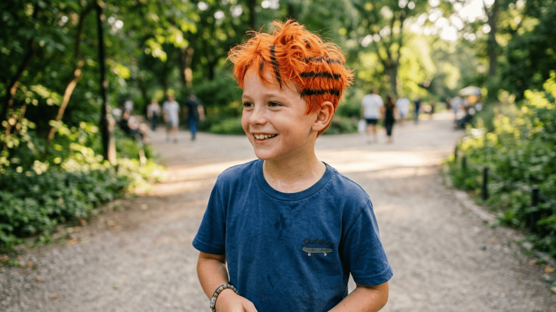 black stripes painted on a boy's orange sprayed hair