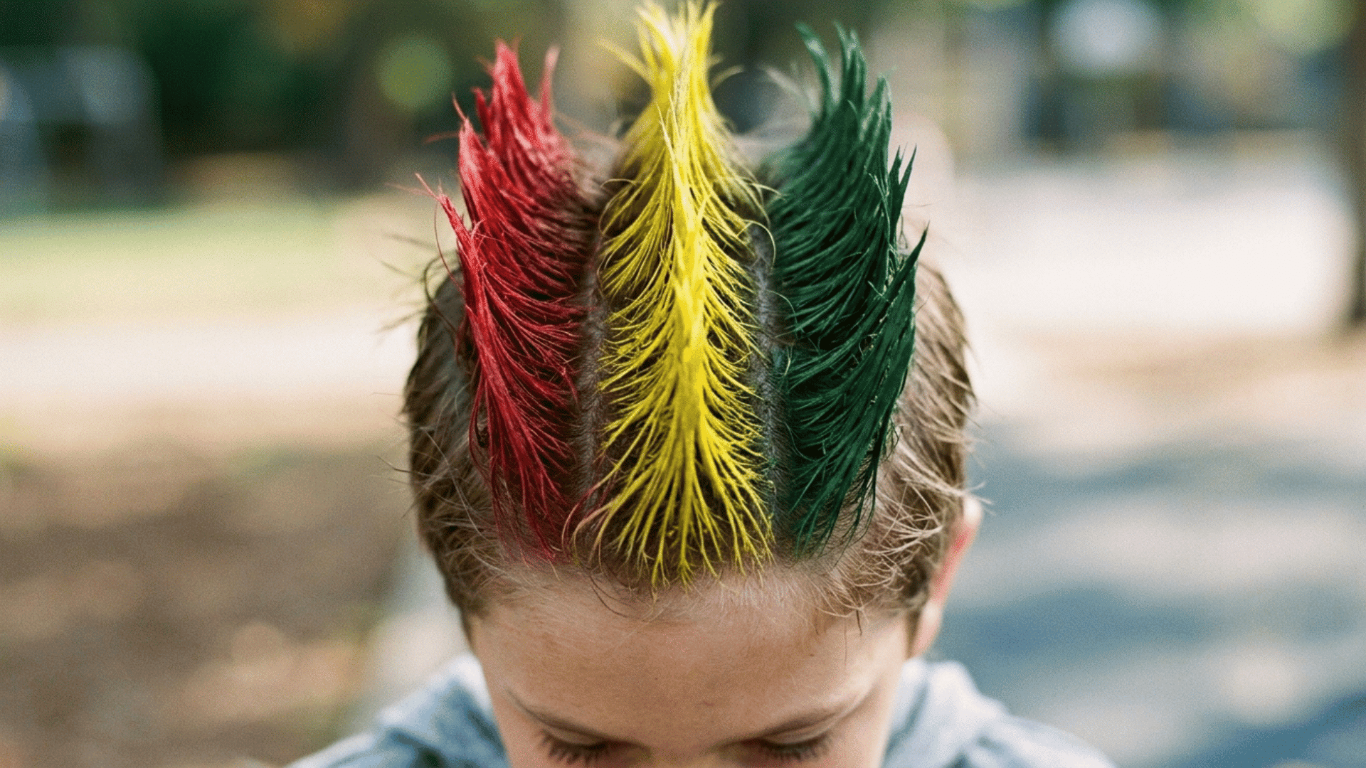 boy's hair spiked and sprayed like a traffic light