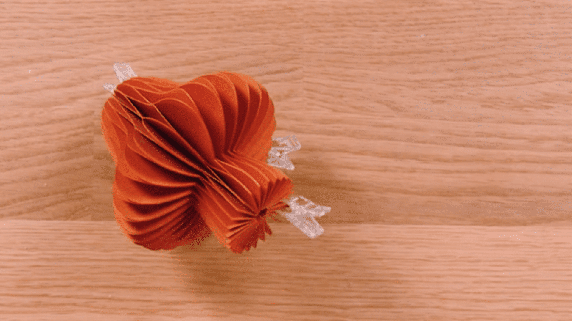 bringing both ends together with glue and using clips to hold the mushroom shape until fully dry
