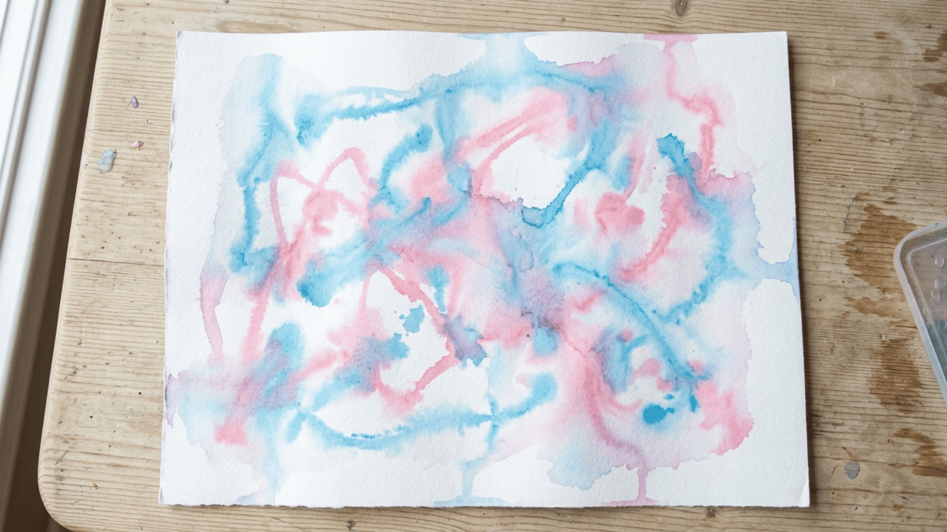 toddler ice cube painting with soft random color trails