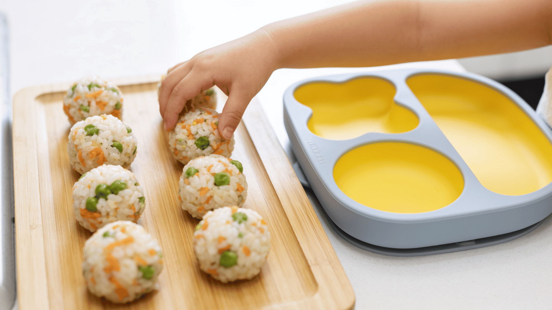 Mini veggie rice balls with peas and carrot, a make-ahead toddler lunch for little hands. (1)