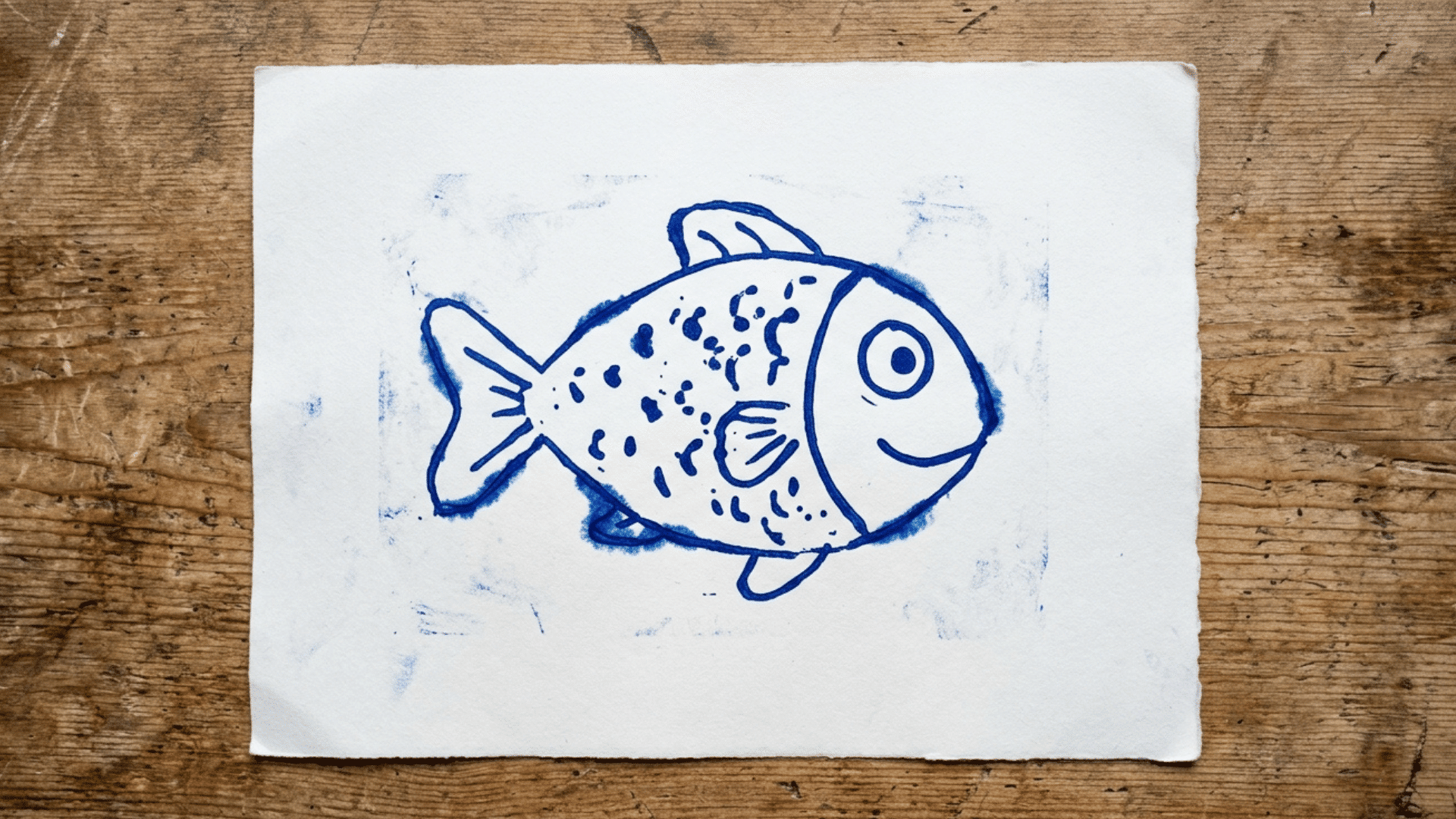 child made monoprint painting of a simple fish shape