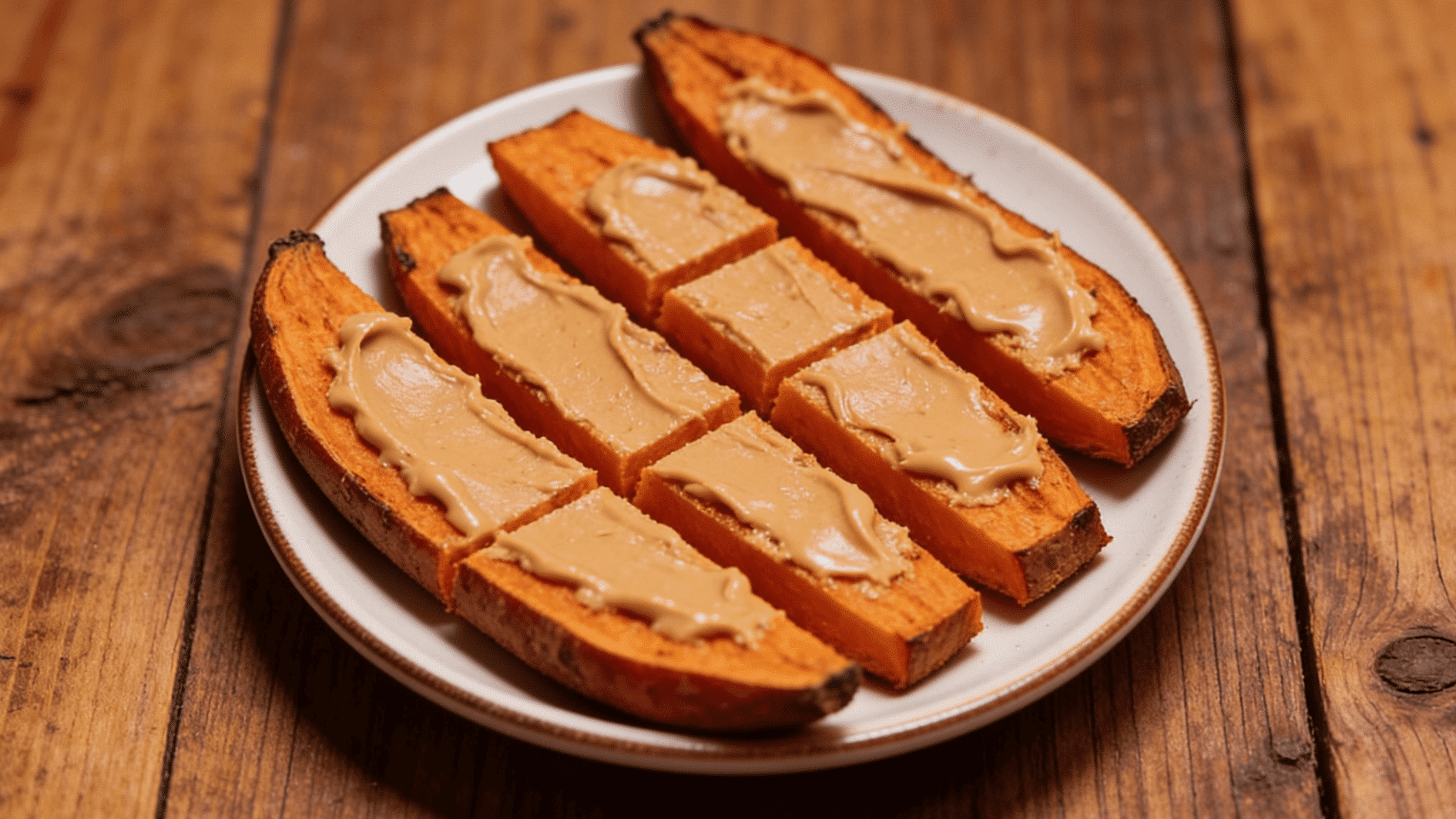 _Roasted sweet potato slices spread with a thin layer of nut butter