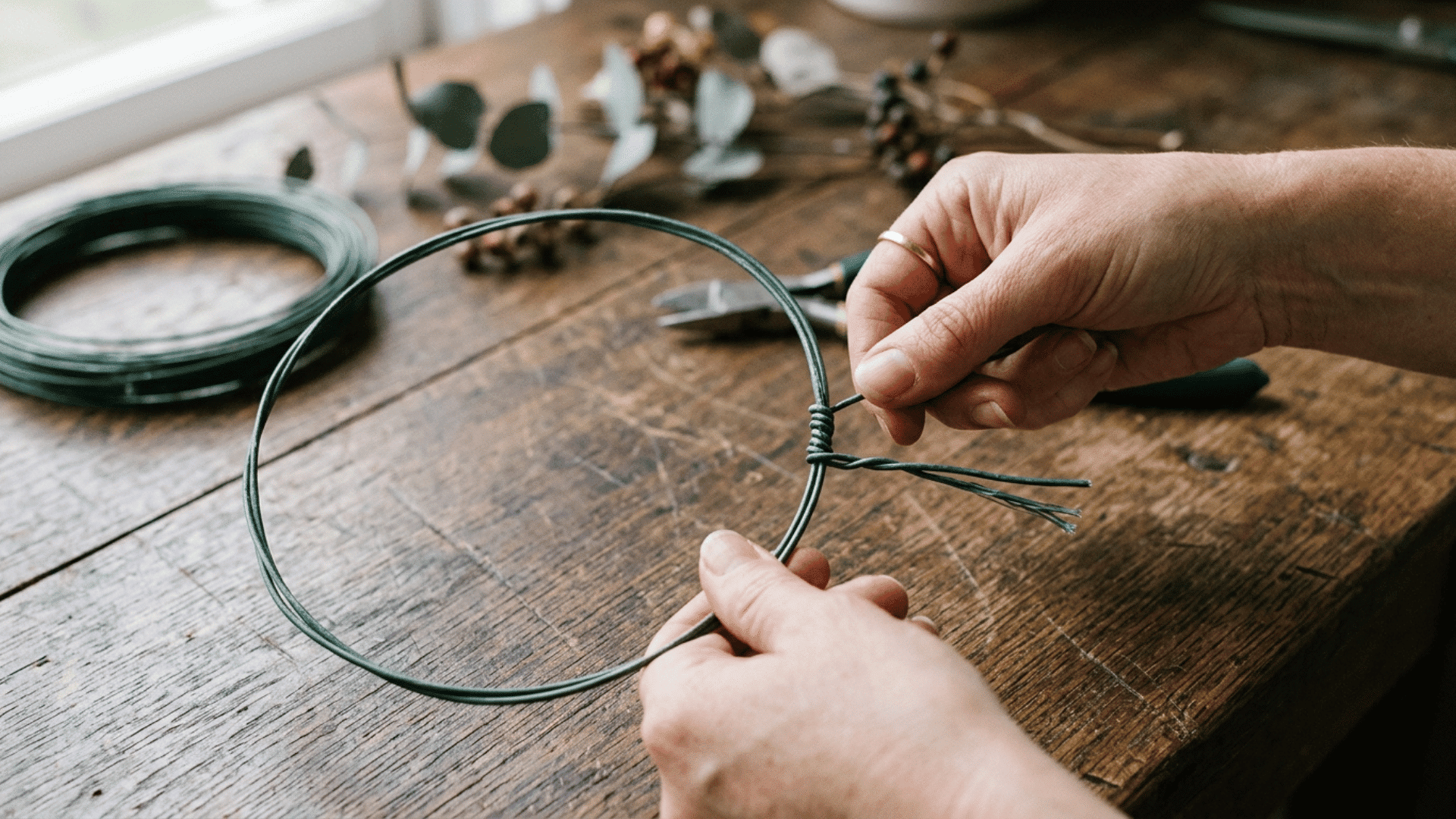 floral wire bent and twisted into a circle shape for a flower crown