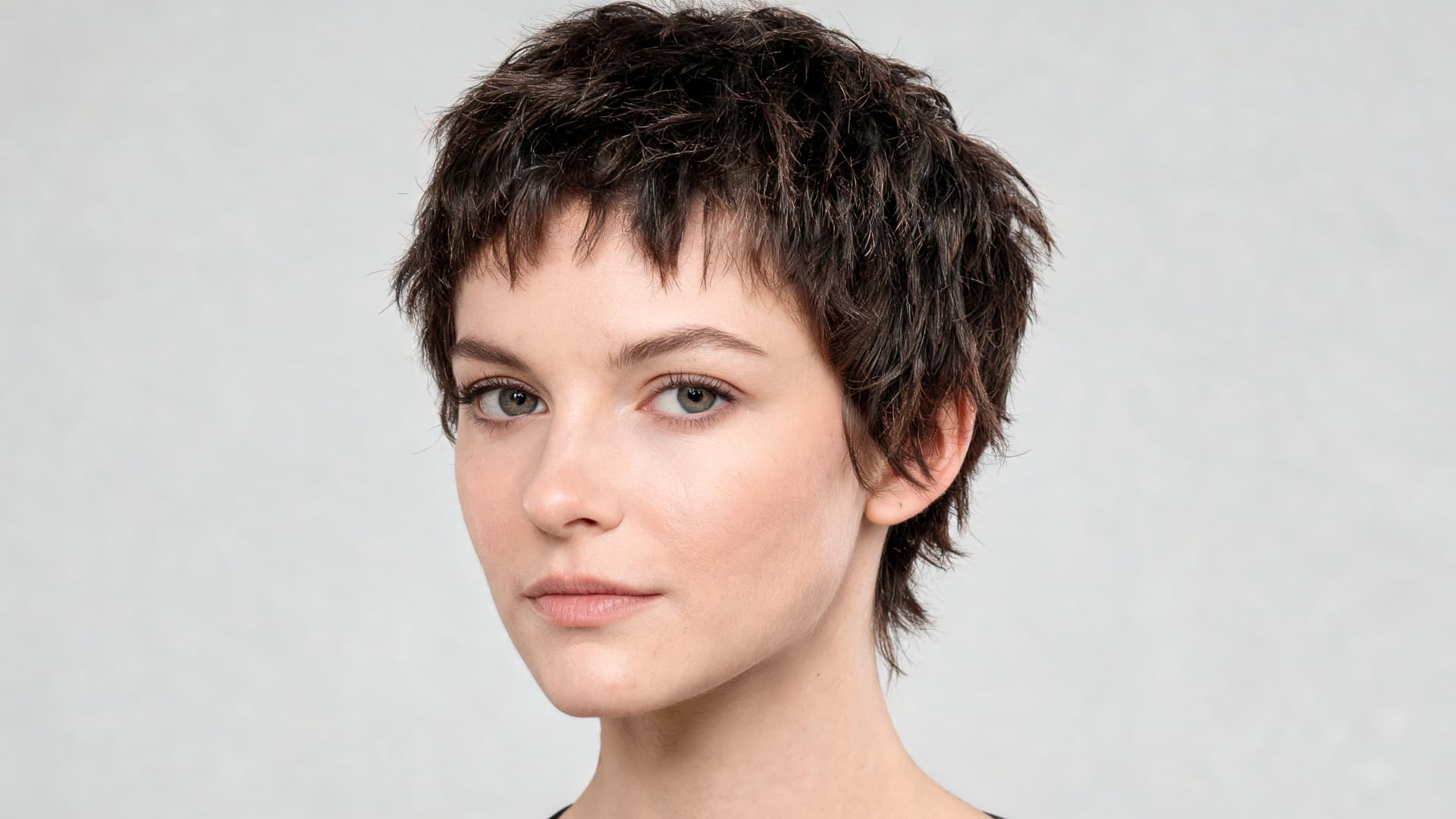 short textured crop haircut for thick hair with uneven layers and effortless natural styling