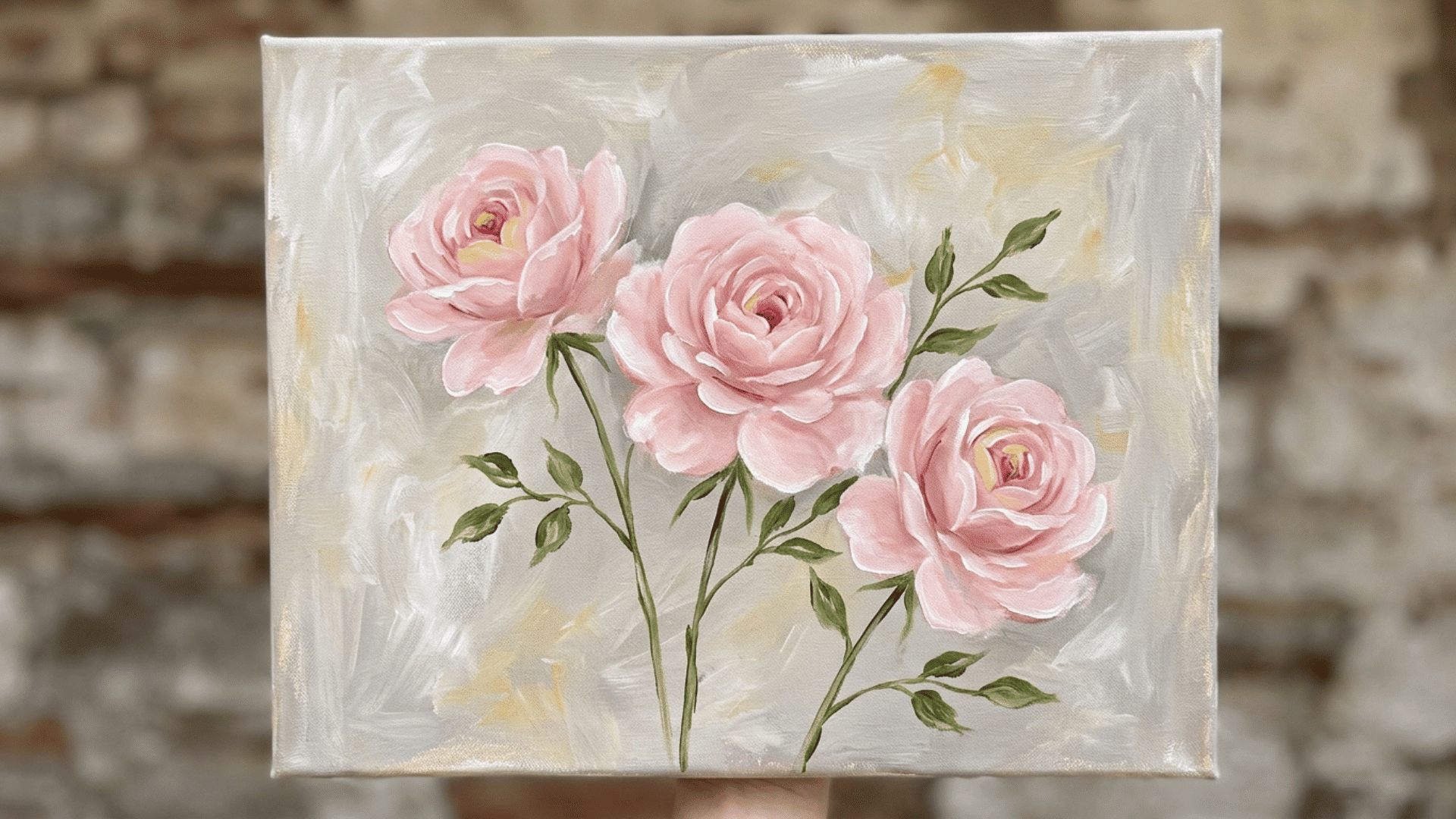 a loose watercolor style pink rose bouquet