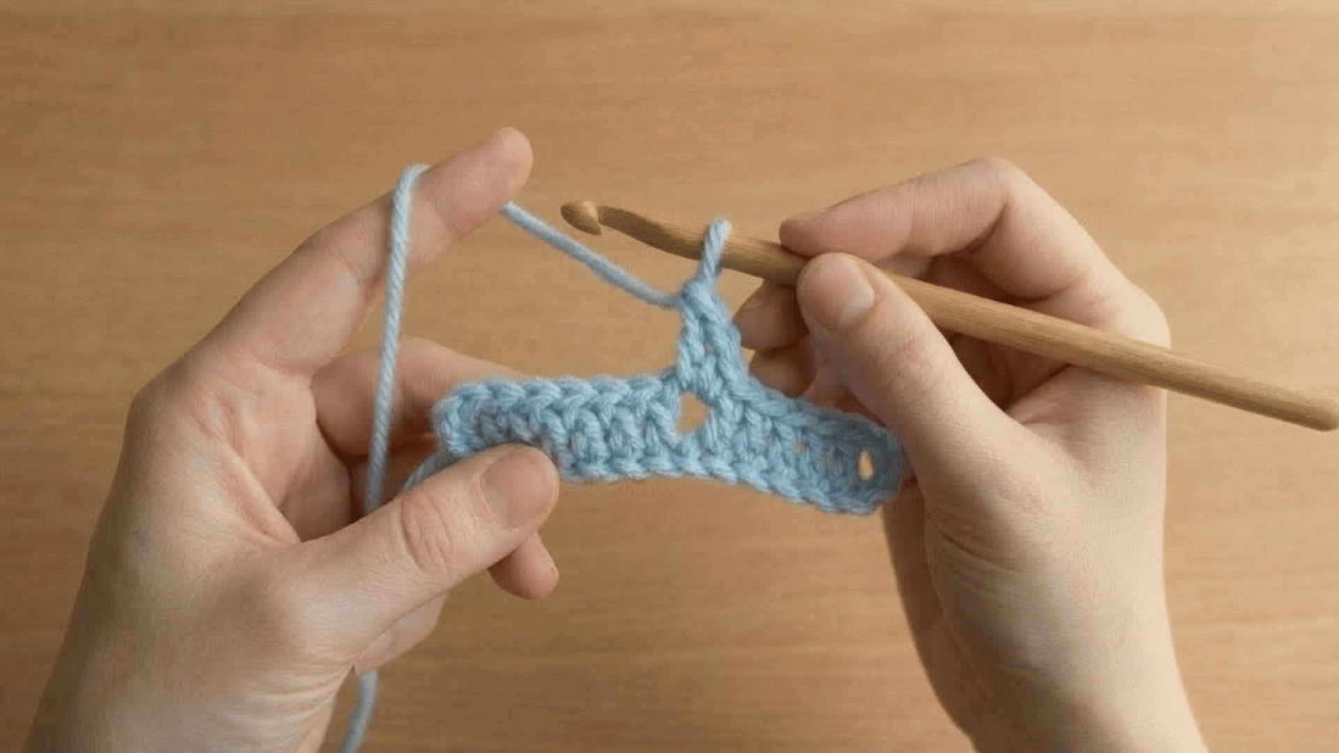 hook inserted into a chain stitch making the first single crochet