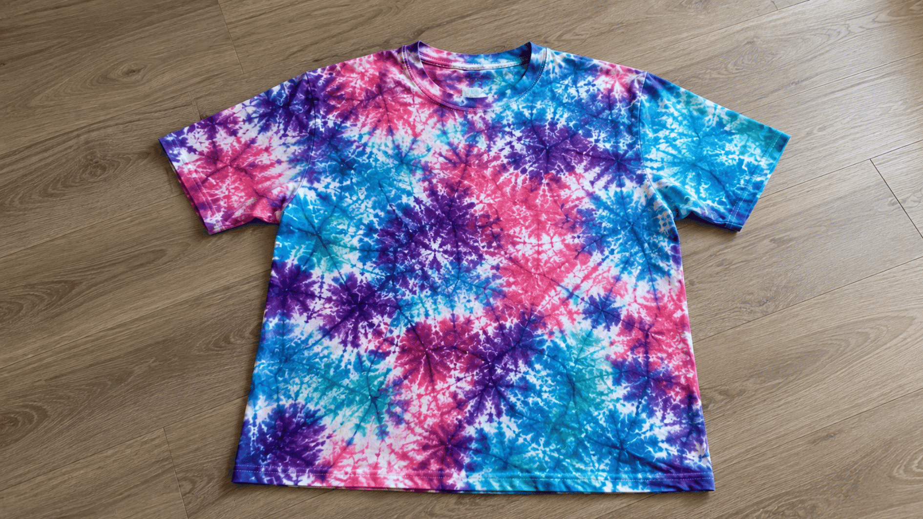 colorful crumple tie dye pattern on an oversized cotton t shirt