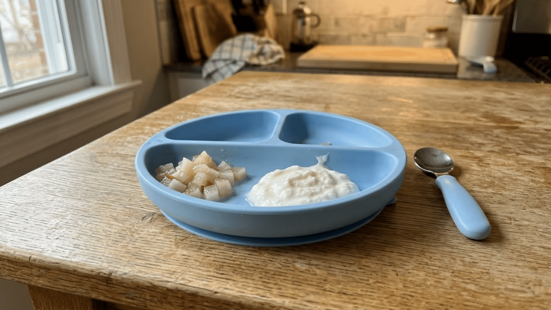 soft steamed pear pieces served with plain whole-milk yogurt