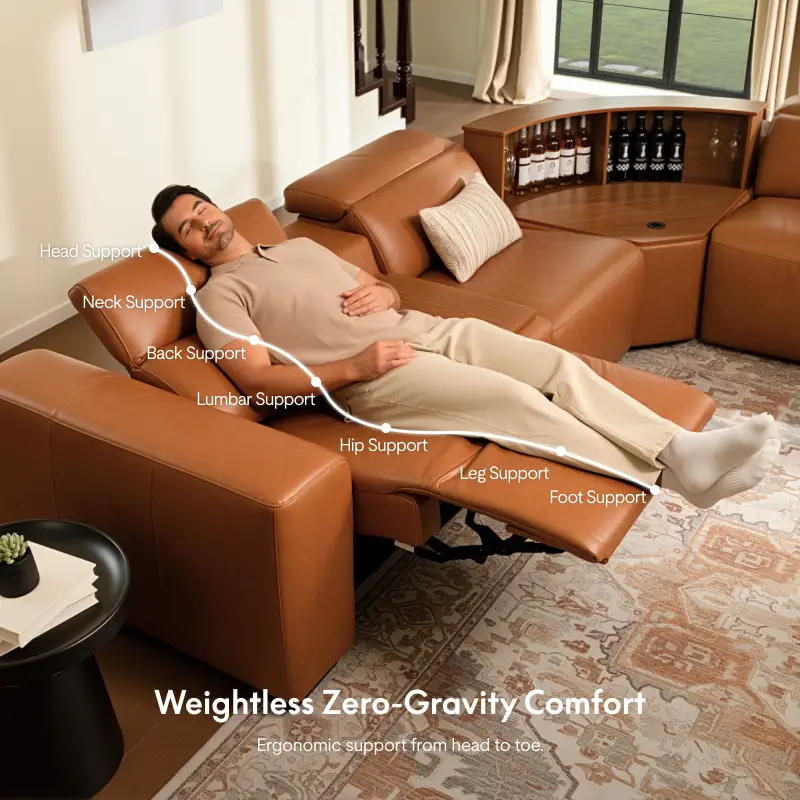 Man relaxing on a brown leather recliner with ergonomic support in cozy living room