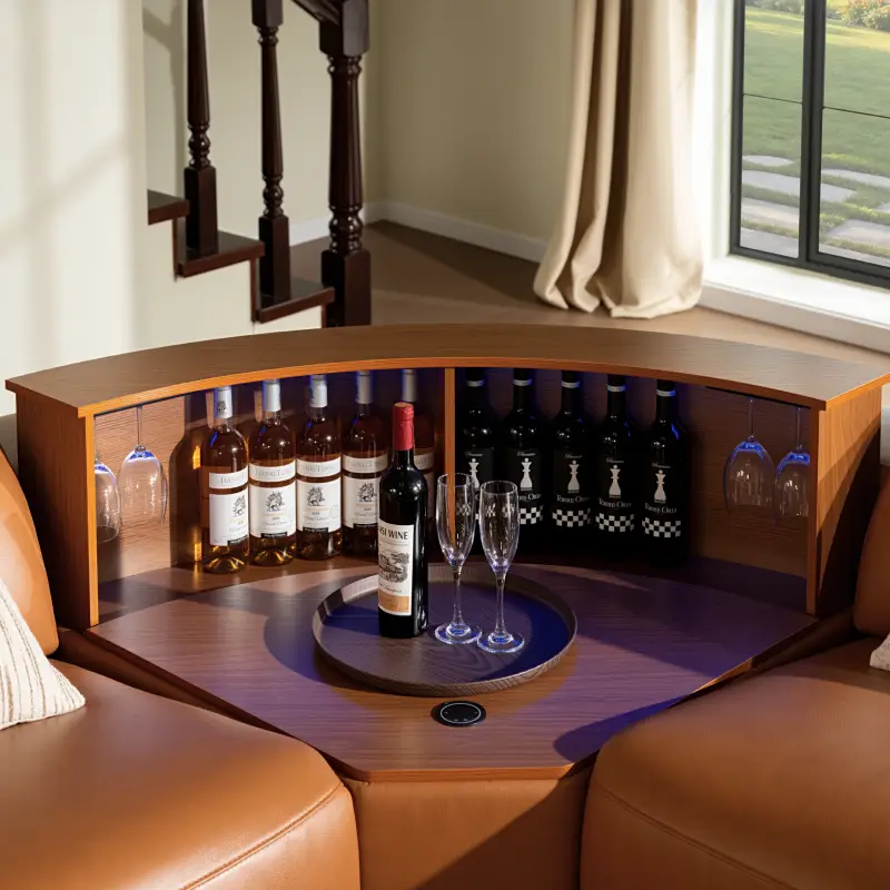 Curved wooden minibar with wine bottles and glasses between leather sofas in a cozy living room